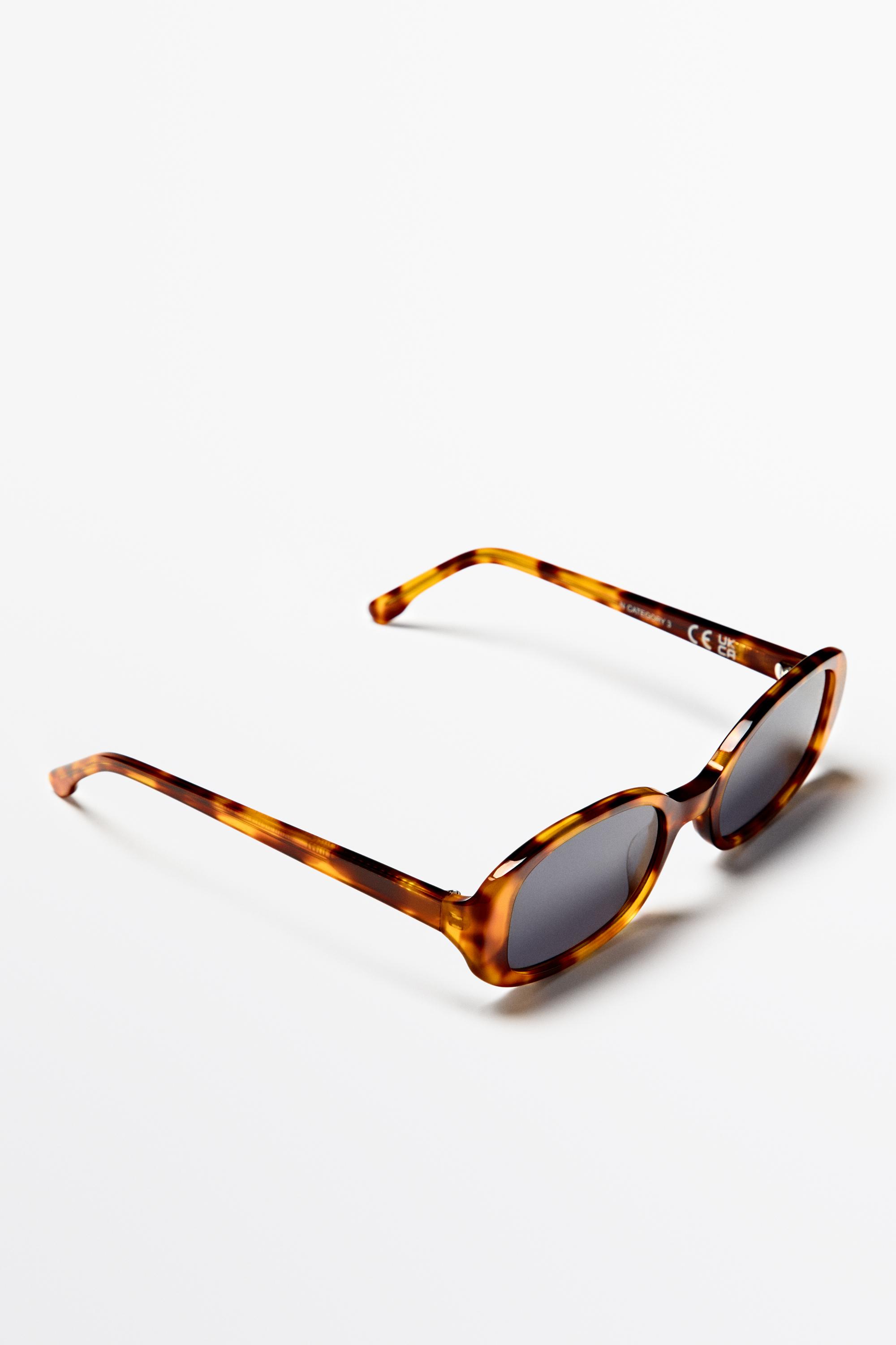 Lunettes de soleil ovales effet écaille